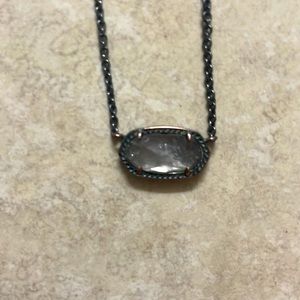 A black gun metal kendra Scott necklace